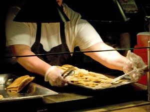  Image of man serving pancakes - links to video